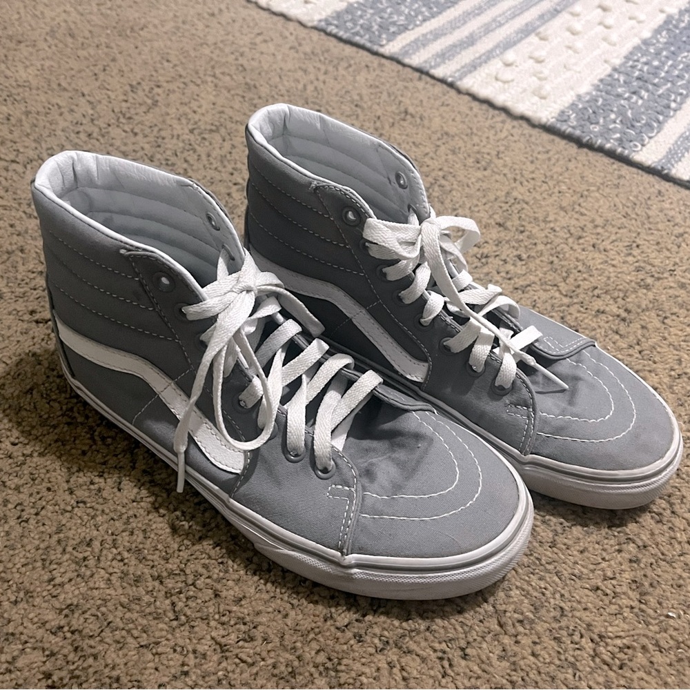 Grey High-top Vans skate shoes